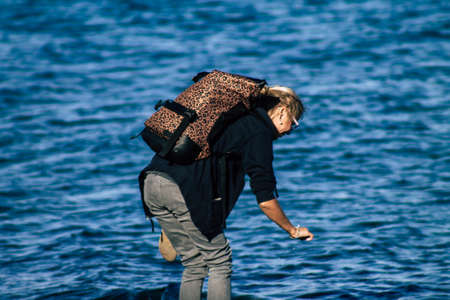 Limassol Cyprus May 05, 2020 View of unidentified young woman having fun on the beach of Limassol in the afternoon during the coronavirus outbreakのeditorial素材
