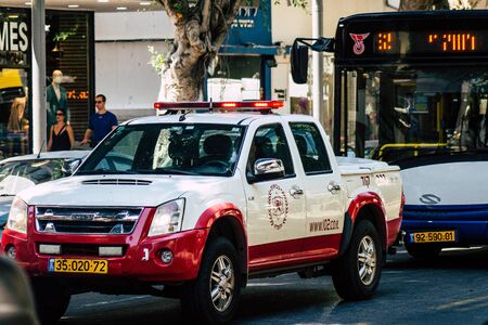 Tel Aviv Israel August 12, 2019 View of traditional Israeli fire engine rolling in the streets of Tel Aviv in the afternoonの写真素材