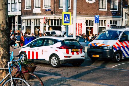 Amsterdam Netherlands April 8, 2019 View of a Dutch police car parked in the streets of Amsterdam in the afternoonの写真素材