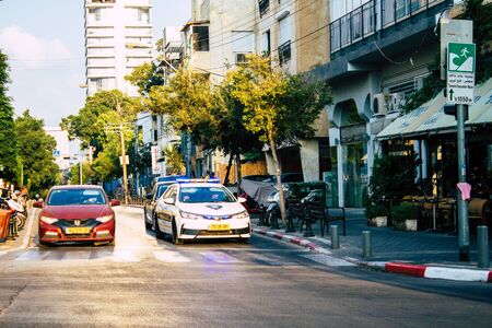 Tel Aviv Israel September 08, 2019 View of a Israeli police car rolling in the streets of Tel Aviv in the afternoonの写真素材