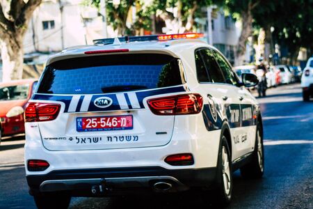Tel Aviv Israel August 13, 2019 View of a Israeli police car rolling in the streets of Tel Aviv in the afternoonの写真素材