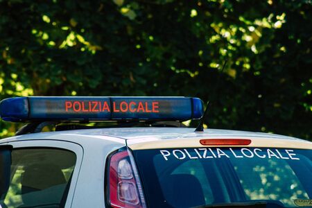 Rome Italy September 21, 2019 View of a Italian local police car parked in the streets of Rome in the morningの写真素材