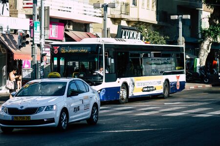 Tel Aviv Israel August 9, 2019 View of traditional Israeli taxi rolling in the streets of Tel Aviv in the afternoonの写真素材
