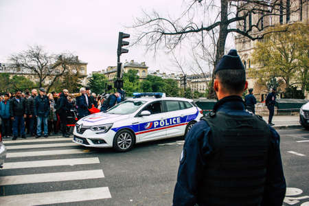 Paris France April 16, 2019  View of police officers who secure the street front the Notre Dame cathedral which burned the day before in a big fire in the afternoonのeditorial素材