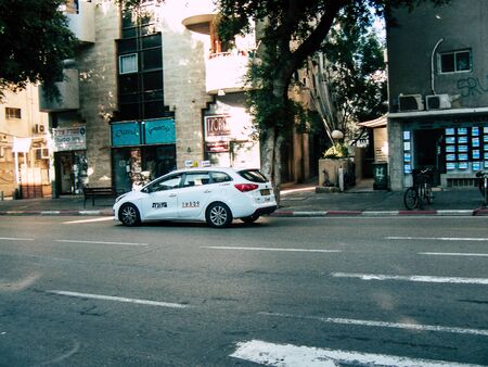Tel Aviv Israel November 25, 2018  View of a traditional Israeli taxi rolling in the streets of Tel...