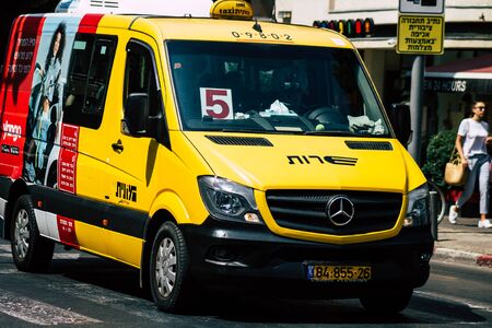 Tel Aviv Israel June 16, 2019 View of traditional taxi rolling in the streets of Tel Aviv in the afternoonの写真素材