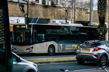 Tel Aviv Israel February 11, 2020 View of a traditional Israeli public city bus rolling in the...