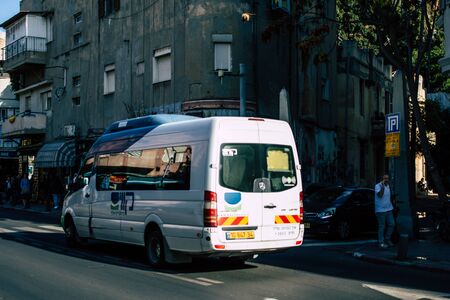 Tel Aviv Israel December 02, 2019 View of a traditional Israeli public city bus rolling in the streets of Tel Aviv in in the afternoon