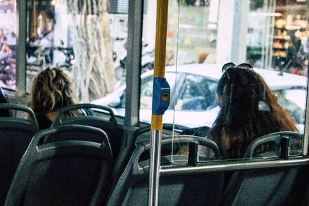 Tel Aviv Israel November 05, 2019 View of unknowns Israeli people travelling in a public bus of the city of Tel Aviv in the afternoonの写真素材
