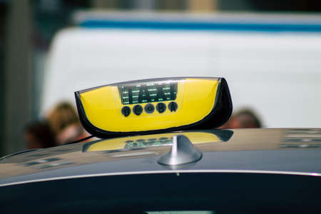 Reims France May 7, 2019 View of a traditional French taxi rolling in the city of Reims in France in the afternoonのeditorial素材