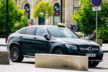 Reims France May 7, 2019 View of a traditional French taxi rolling in the city of Reims in France in...