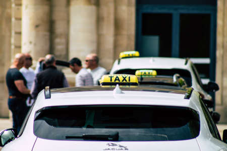 Reims France May 7, 2019 View of a traditional French taxi rolling in the city of Reims in France in the afternoonのeditorial素材