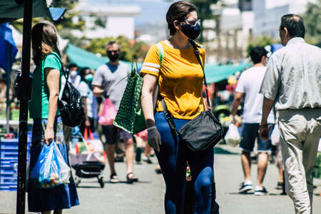 Limassol Cyprus May 09, 2020 View of an unidentified people with a face mask to protect themselves from the coronavirus shopping in the Limassol market in the morningのeditorial素材