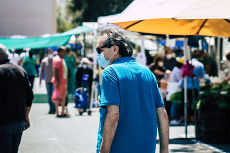 Limassol Cyprus May 09, 2020 View of an unidentified people with a face mask to protect themselves from the coronavirus shopping in the Limassol market in the morningのeditorial素材