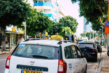 Tel Aviv Israel April 07, 2020 View of traditional Israeli taxi rolling in the streets of Tel Aviv...