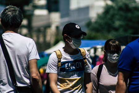 Limassol Cyprus May 09, 2020 View of an unidentified people with a face mask to protect themselves from the coronavirus shopping in the Limassol market in the morningのeditorial素材