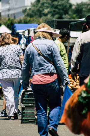 Limassol Cyprus May 09, 2020 View of an unidentified people without a face mask to protect themselves from the coronavirus shopping in the Limassol market in the morningのeditorial素材