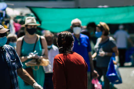 Limassol Cyprus May 09, 2020 View of an unidentified people without a face mask to protect themselves from the coronavirus shopping in the Limassol market in the morningのeditorial素材