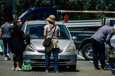 Limassol Cyprus May 09, 2020 View of an unidentified people without a face mask to protect themselves from the coronavirus shopping in the Limassol market in the morningのeditorial素材