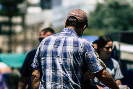 Limassol Cyprus May 09, 2020 View of an unidentified people without a face mask to protect themselves from the coronavirus shopping in the Limassol market in the morningのeditorial素材
