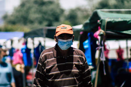 Limassol Cyprus May 09, 2020 View of an unidentified people with a face mask to protect themselves from the coronavirus shopping in the Limassol market in the morningのeditorial素材