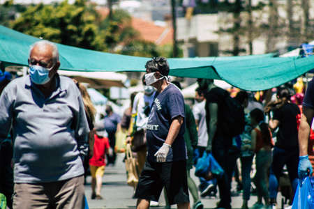 Limassol Cyprus May 09, 2020 View of an unidentified people with a face mask to protect themselves from the coronavirus shopping in the Limassol market in the morningのeditorial素材