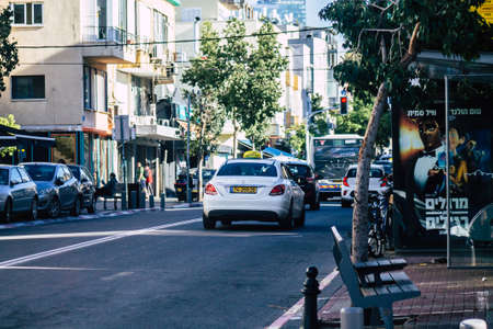 Tel Aviv Israel December 30, 2019 View of traditional Israeli taxi rolling in the streets of Tel Aviv in the afternoonのeditorial素材