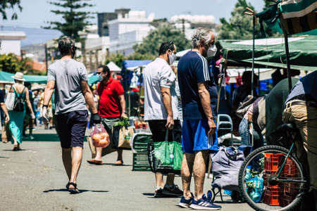 Limassol Cyprus May 09, 2020 View of an unidentified people without a face mask to protect themselves from the coronavirus shopping in the Limassol market in the morningのeditorial素材