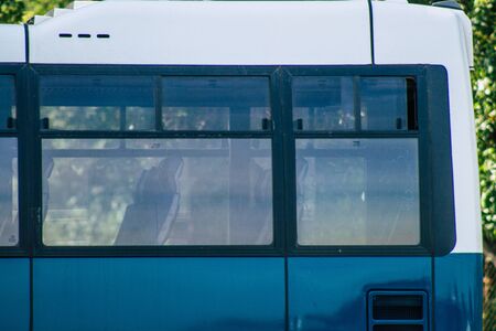 Rome Italy September 15, 2019 View of blue public buses parked at the bus stand in Rome in the morningの写真素材