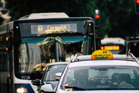 Tel Aviv Israel August 9, 2019 View of traditional city bus rolling in the streets of Tel Aviv in the afternoonの写真素材