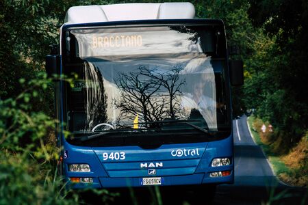 Rome Italy September 18, 2019 View of a public bus rolling through the streets of Rome in the morningの写真素材
