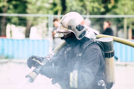 Reims France May 18, 2019 View of firefighters extinguishing a construction hut burned by rioters...
