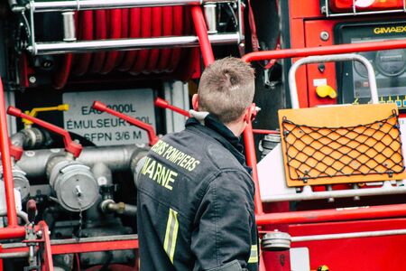 Reims France May 18, 2019 View of firefighters extinguishing a construction hut burned by rioters...