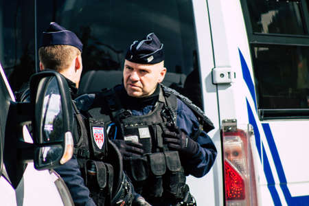 Paris France May 11, 2019 View of a riot squad of the French National Police in intervention during protests of the Yellow Jackets against the policy of President Macron in Paris on saturday afternoonのeditorial素材