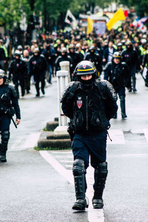 Paris France May 11, 2019 View of a riot squad of the French National Police in intervention during protests of the Yellow Jackets against the policy of President Macron in Paris on saturday afternoonのeditorial素材
