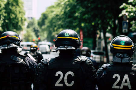 Paris France May 11, 2019 View of a riot squad of the French National Police in intervention during protests of the Yellow Jackets against the policy of President Macron in Paris on saturday afternoonのeditorial素材