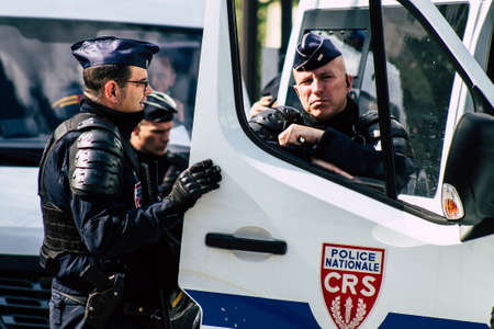 Paris France May 11, 2019 View of a riot squad of the French National Police in intervention during protests of the Yellow Jackets against the policy of President Macron in Paris on saturday afternoonのeditorial素材