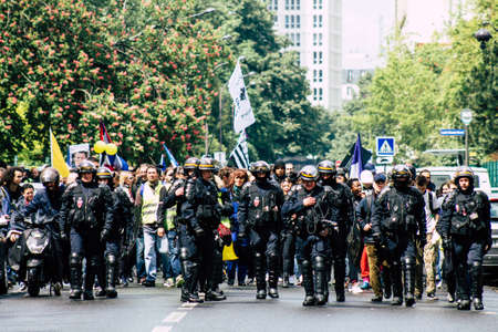 Paris France May 11, 2019 View of a riot squad of the French National Police in intervention during protests of the Yellow Jackets against the policy of President Macron in Paris on saturday afternoonのeditorial素材