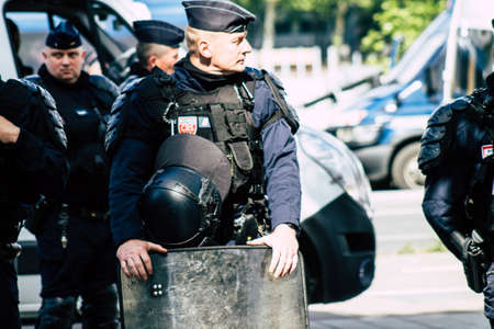 Paris France May 11, 2019 View of a riot squad of the French National Police in intervention during protests of the Yellow Jackets against the policy of President Macron in Paris on saturday afternoonのeditorial素材