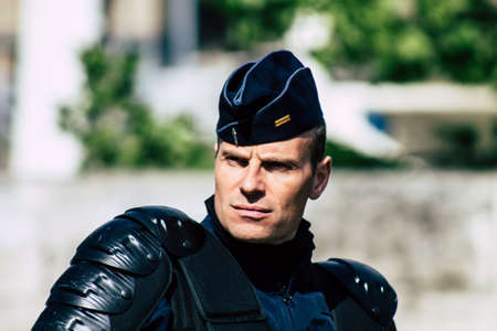 Paris France May 11, 2019 Portrait of a riot squad of the French National Police in intervention during protests of the Yellow Jackets against the policy of President Macron in Paris on saturday afternoonのeditorial素材