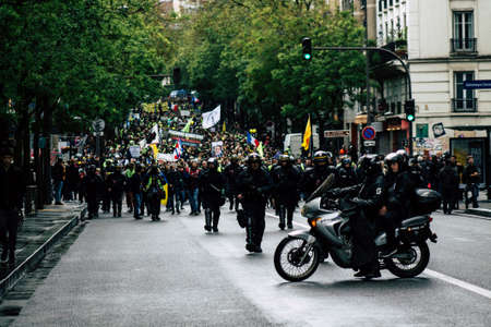 Paris France May 11, 2019 View of a riot squad of the French National Police in intervention during protests of the Yellow Jackets against the policy of President Macron in Paris on saturday afternoonのeditorial素材
