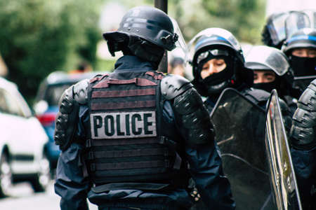 Paris France May 04, 2019 View of a riot squad of the French National Police in intervention during protests of the Yellow Jackets against the policy of President Macron in Paris on saturday afternoonのeditorial素材