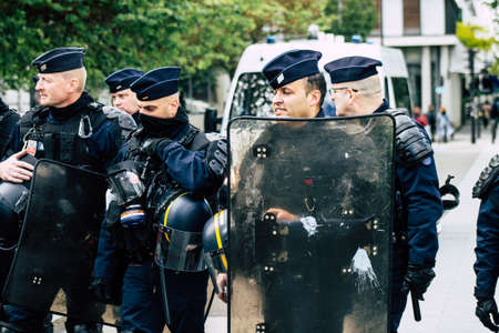 Paris France May 11, 2019 View of a riot squad of the French National Police in intervention during protests of the Yellow Jackets against the policy of President Macron in Paris on saturday afternoonのeditorial素材