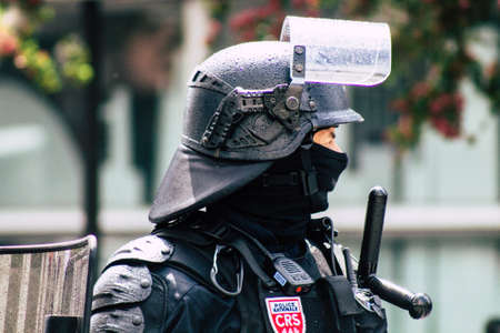 Paris France May 11, 2019 Portrait of a riot squad of the French National Police in intervention during protests of the Yellow Jackets against the policy of President Macron in Paris on saturday afternoonのeditorial素材
