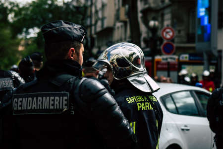 Paris France May 04, 2019 View of a riot squad of the French National Police in intervention during protests of the Yellow Jackets against the policy of President Macron in Paris on saturday afternoonのeditorial素材