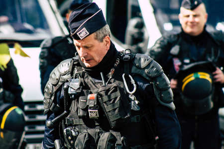 Paris France May 11, 2019 View of men of the French National Police walking in the streets of Paris...