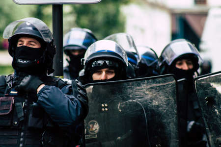 Paris France May 04, 2019 View of a riot squad of the French National Police in intervention during protests of the Yellow Jackets against the policy of President Macron in Paris on saturday afternoonのeditorial素材