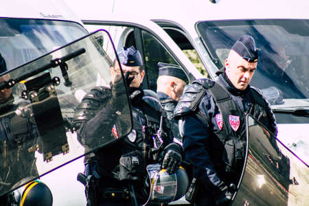 Paris France May 11, 2019 View of a riot squad of the French National Police in intervention during protests of the Yellow Jackets against the policy of President Macron in Paris on saturday afternoonのeditorial素材