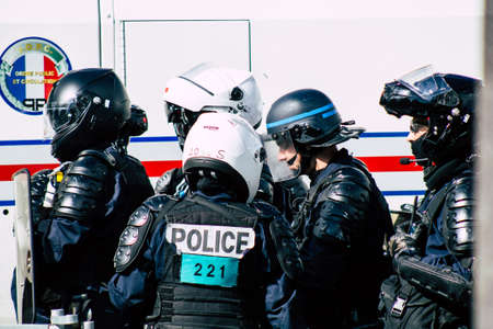 Paris France May 04, 2019 View of a riot squad of the French National Police in intervention during protests of the Yellow Jackets against the policy of President Macron in Paris on saturday afternoonのeditorial素材