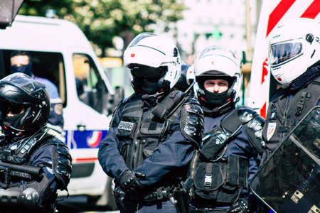 Paris France May 04, 2019 View of a riot squad of the French National Police in intervention during protests of the Yellow Jackets against the policy of President Macron in Paris on saturday afternoonのeditorial素材